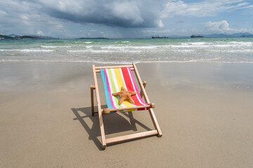 Deck chair at the tropical beach