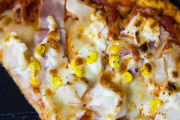 Slice of fresh Pizza with Sausage.