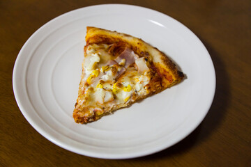 Slice of fresh Pizza with Sausage.
