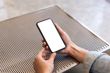 cell phone blank white screen mockup.woman hand holding texting using mobile on desk at office.background empty space for advertise.work people contact marketing business,technology