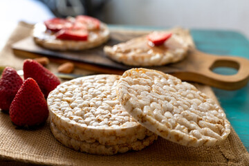rice crackers, whit fruits on table blue
