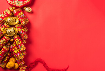 Chinese new year festival, Top view flat lay happy chinese new year or lunar new year decorations celebration with copy space on red background (Chinese character 