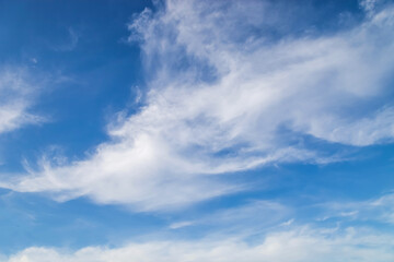 Naklejka na ściany i meble nature background., white clouds over blue sky soft focus.