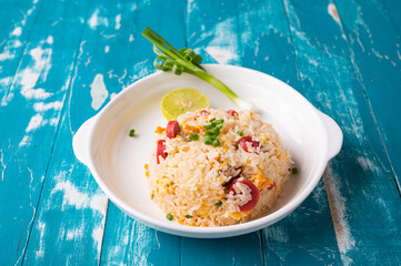 Asian Fried Jasmin rice with sausage and eggs.