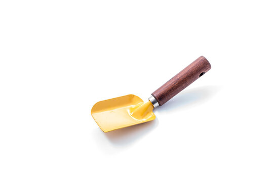 Mini yellow  shovel with wooden handle