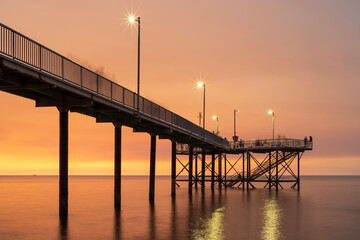 Fototapeta na wymiar Nightcliff Jetty at sunset in Darwin, Australia.