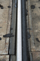 Emporia, Kansas  5-16-2015
Examples of railroad track repairs in Emporia, Kansas at the main crossing on Commercial street. Showing where the tracks have been welded and the dates and by whom. 