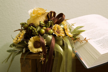 Flowers Beside an Open Bible