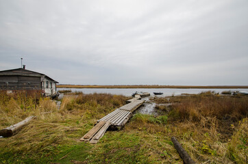 October, 2020 - Lapominka. Marine pier for boats in the northern Russian village. Russia, Arkhangelsk region