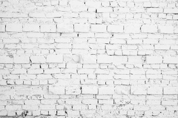 Black gray brick wall background. Monotone texture of a flat brick wall close-up.