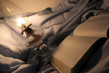 Lamp Beside an Open Bible