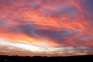 colored clouds at early morning sunrise 