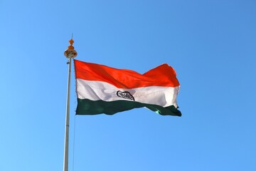 Naklejka na ściany i meble The national flag of India. Fabric tricolor flag. Indian republic day. Independence day.