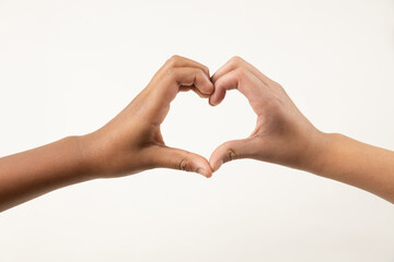 hands making a heart sign with therir hands