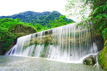 The waterfall formed by the interceptor dam. Hualien County, Taiwan is a very popular place for leisure travel.