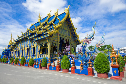 Ubosot of Buddhist temple of Wat Rong Sear Tean (Blue Temple) close-up sunny day. Chiang Rai, Thailand
