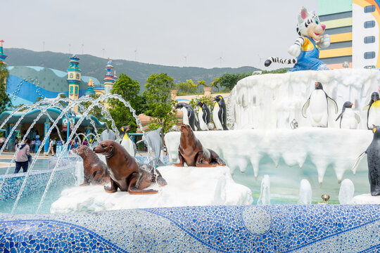 Statue of seals and penguins with fountains the gate of Chimelong Ocean Kingdom, Zhuhai, China