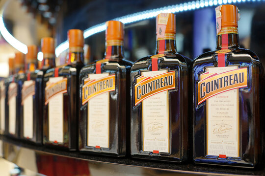 Cointreau brand of triple sec bottles on a store shelf in KLIA Airport. It is an orange-flavored liqueur produced in France. KUALA LUMPUR, MALAYSIA - JUNE 24, 2018.