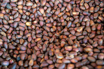 Natural background with pine nuts close up