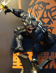 Naklejka premium Close up of Venom figures on display shelf in Ximending shopping Mall. Venom is a fictional character appearing in American comic books published by Marvel Comics. TAIPEI, TAIWAN - JUNE 25, 2018.