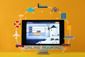 Open page of online booking service on screen of computer monitor against color background