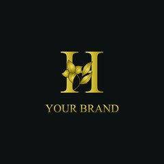 Golden Luxury Initial letter H with flower for cosmetic, boutique, florist, jewelry, hotel logo concept vector