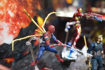 Naklejka premium Close up Spider-Man figures on display shelf in Ximending shopping Mall. The Avengers are a fictional team of superheroes appearing in American comic books by Marvel.