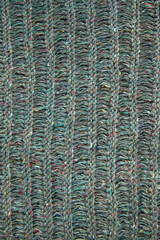 Wool knitted fabric in mixed grey, olive, some colors, eyelet pattern, knit, handmade, vertical photo
