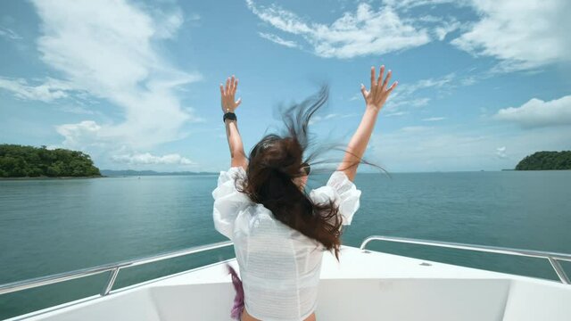 excited tourist enjoying and relaxing on speedboat excited tourist enjoying and relaxing on speedboat