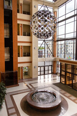 Hotel hall interior with a fountain