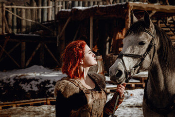 Fototapeta na wymiar Viking girl. Reconstruction of a medieval scene