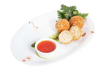 Restaurant service concept. Freshly made minced chicken donuts. Dessert balls on a white plate.