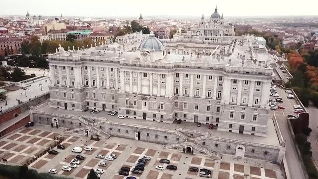 Spain Madrid Capilla Real Jardines de Sabatini gardens fly backwards from building over garden drone aerial shot look view from above autumn 