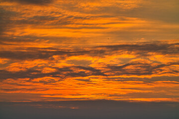 Naklejka na ściany i meble Sunset sky and clouds. Fantastic landscape with sunset. This texture is suitable for background or material. 