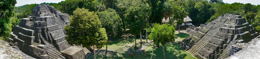 Fototapeta na wymiar Yaxha, Guatemala, Central America: Ruins/pyramids of the North Acropolis at the archaeological site - panorama picture