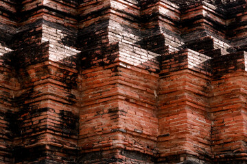 Old brick wall background. Ancient Thailand temple building.