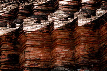 Old brick wall background. Ancient Thailand temple building.