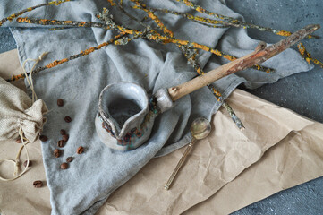 Ceramic Japanese Turk for brewing coffee in wabi sabi style.Turkish coffee pot. Clay dishes. Ecology conceptHandmade ceramic dishes.