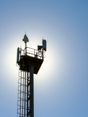 silhouette of the platform on the top of the cell tower