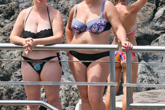 women body positive on beach