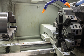 Cnc machine. The CNC lathe machine or Turning machine. Turning numerical control machine with tools and chuck.