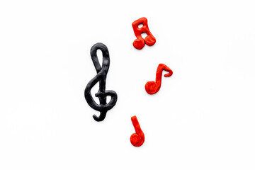 Abstract music notes made of rubber, top view. Music background