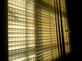 light in the window of a building