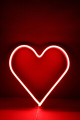 Neon sign red heart in the decor. Trendy style. Valentine day. Neon sign. Custom neon. Home decor.