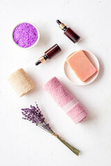 Obraz na płótnie Canvas Set lavender cosmetic pharmacy products with essential oil and sea salt