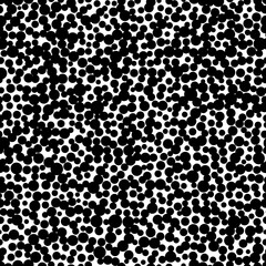 Monochrome seamless pattern with black dots on white background