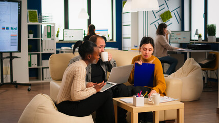 Multiethnic business team brainstorming on project during start up meeting, diverse employees group listening colleagues, sharing idea, discussing new marketing plan at professional group briefing