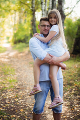 Fototapeta premium A father and daughter in forest on a meadow