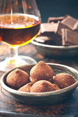 Tasty sweet chocolate truffles, closeup.  Gourmet food, delicious dessert