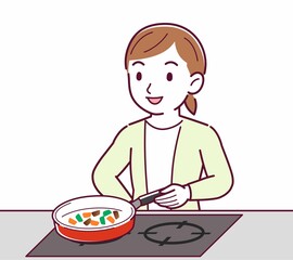 Young woman in a cardigan_cooking